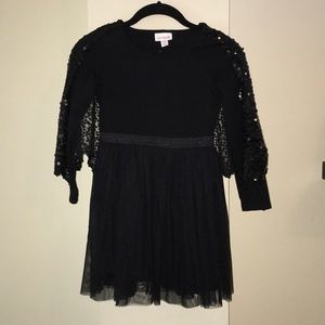 Black sequins “bat” dress